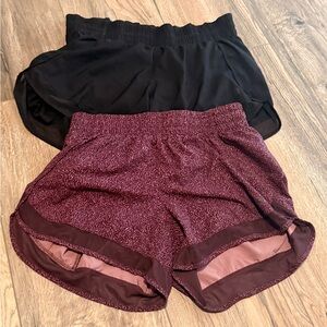 2 Pairs of Women's XS Athleta Shorts - Black & Burgundy